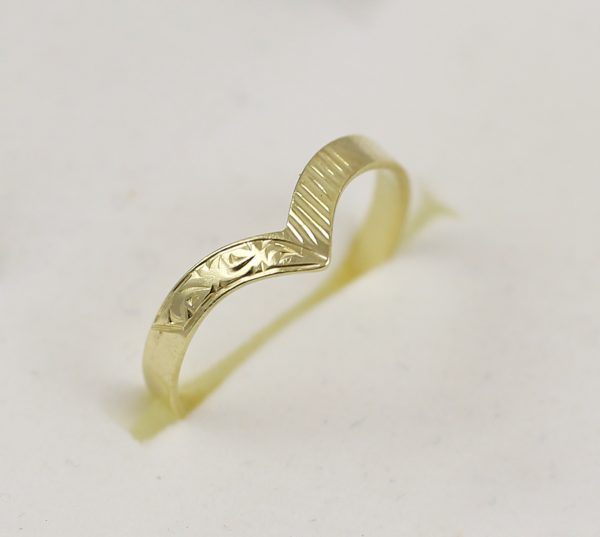 Zlatý prsten zdobená špička