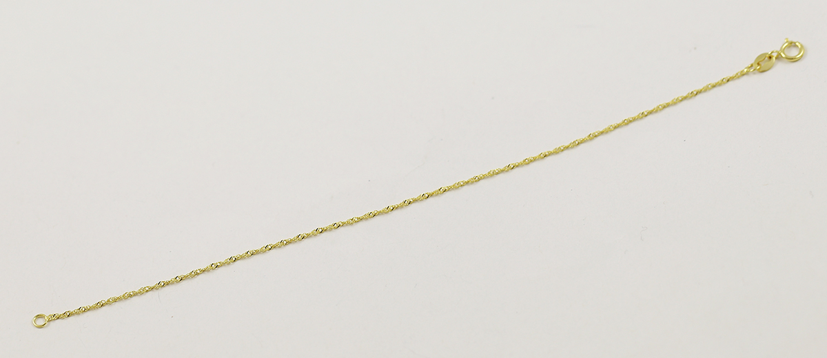 Jemný kroucený zlatý náramek