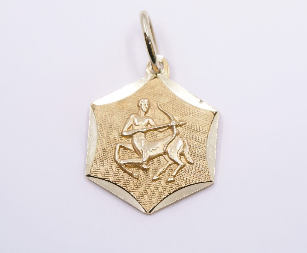 Přívěsek střelec