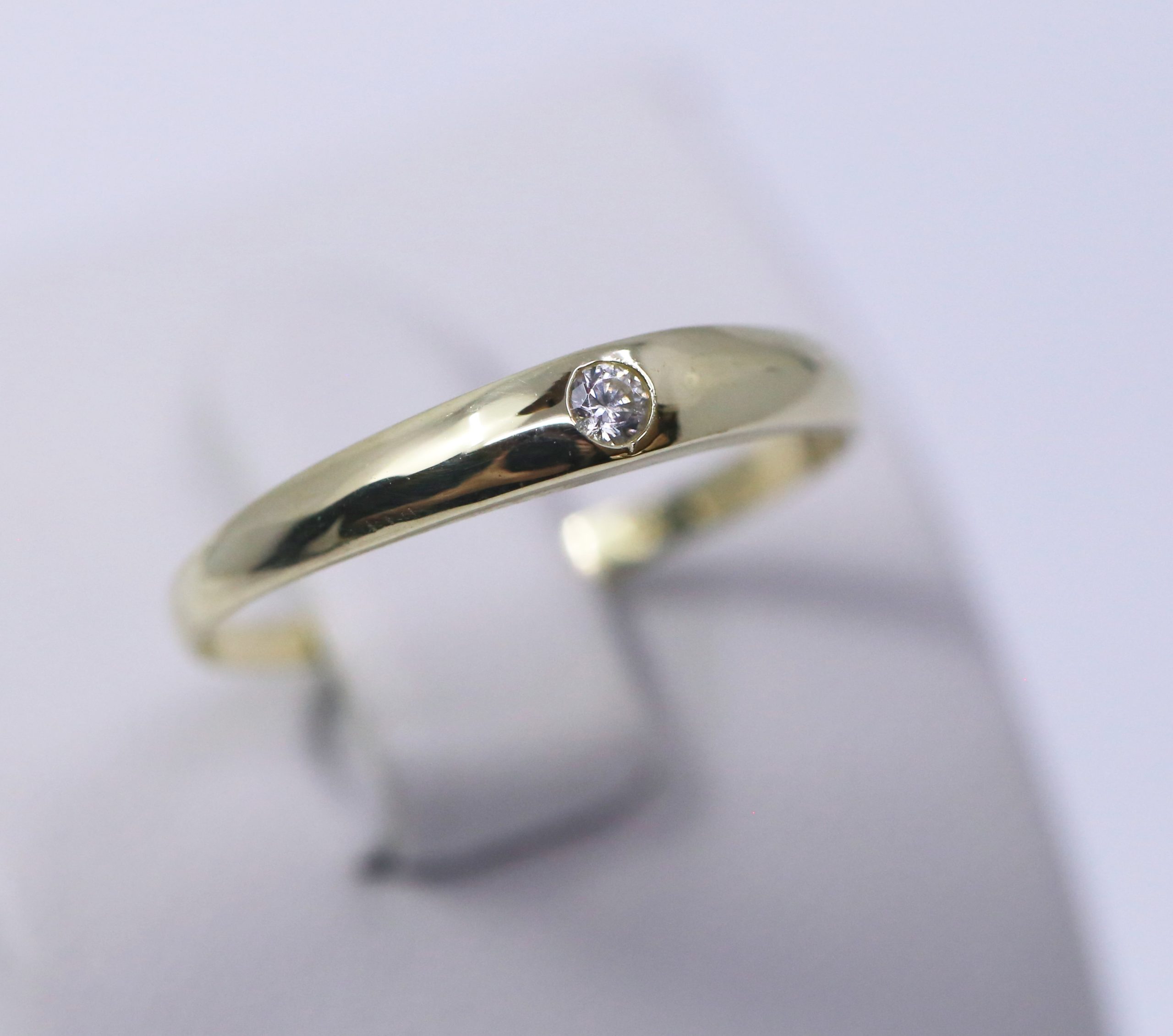 Zlatý dámský prsten s jedním zirkonem 14k – 1,05g